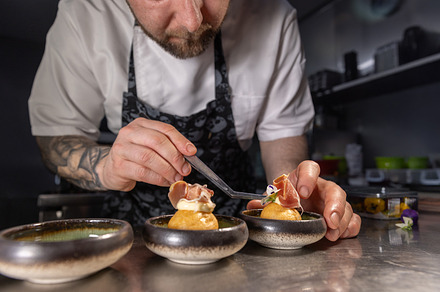 Chef preparing gourmet appetizers, a Photo by Grafvision photography