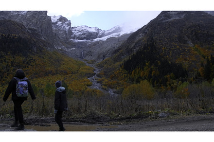 Side view of hiker family walking on, a Nature Photo by Media Whale Stock