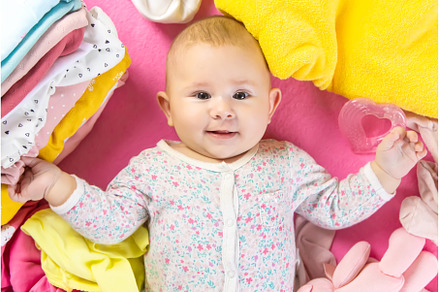 Baby scattered clothes and toys, a Beauty & Fashion Photo by yanadjana