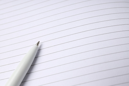 Blank notebook with pen on whole background, a Business Photo by AtlasStudio PRO