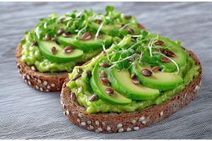 Avocado and microgreen are served on, a Food & Drink Photo by ZinetroN