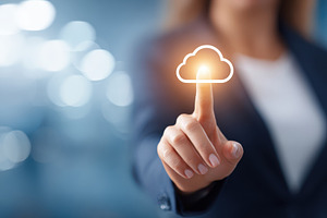 Businesswoman interacting with cloud technology, a Technology Photo by AlyaAnd