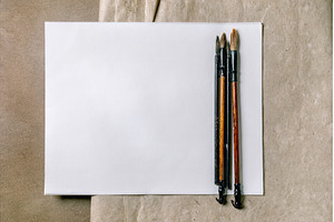Paint Brushes on Empty White Canvas, a Background Photo by Natasha Breen