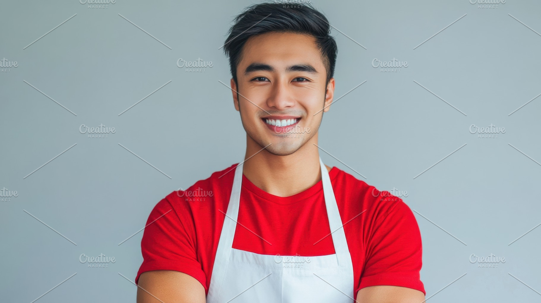 Smiling chef in red shirt with apron, a Photo by Beautiful things