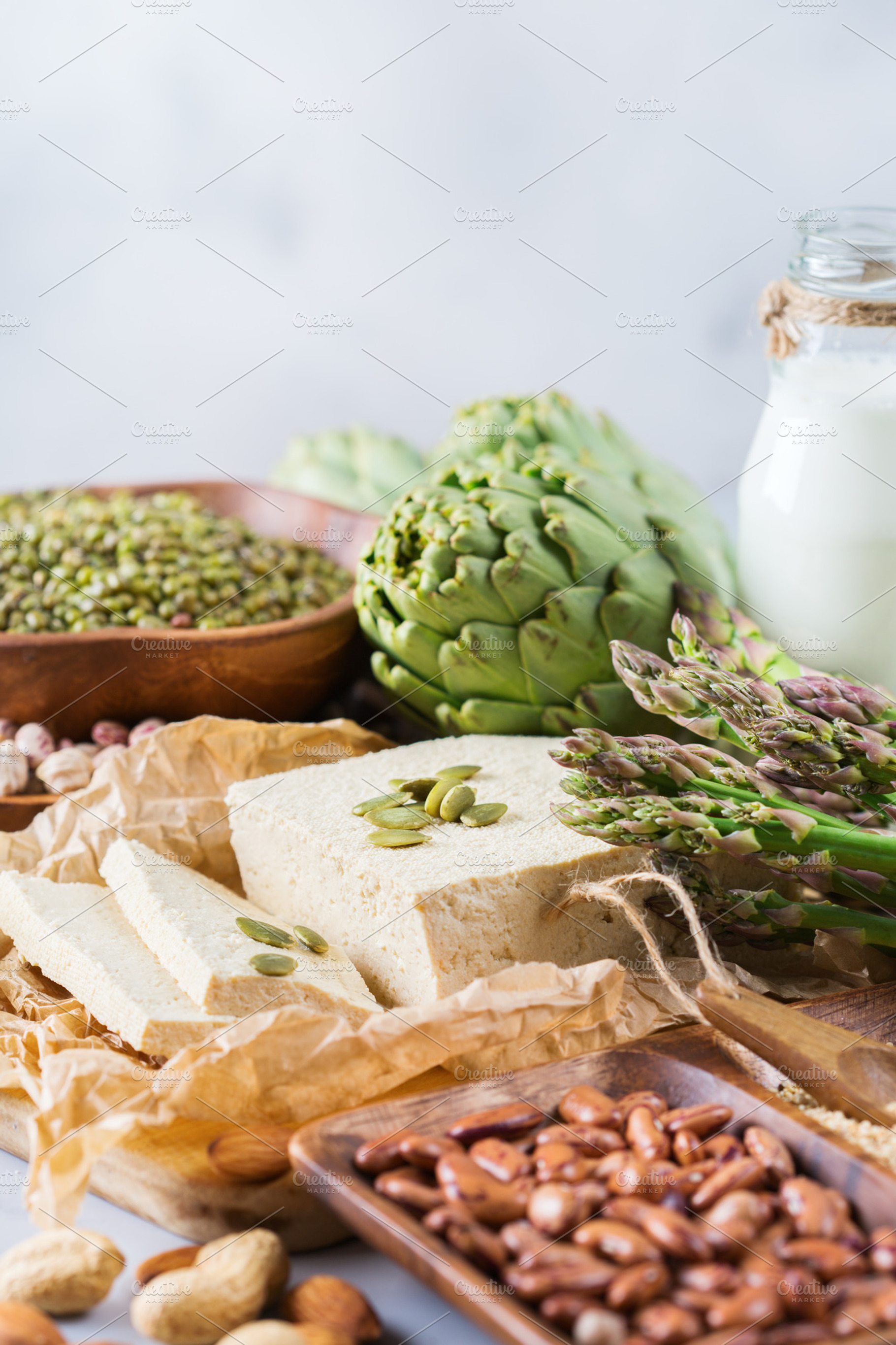 Assortment of healthy vegan protein source and body building food containing, a Food & Drink Photo by Antonina Vlasova