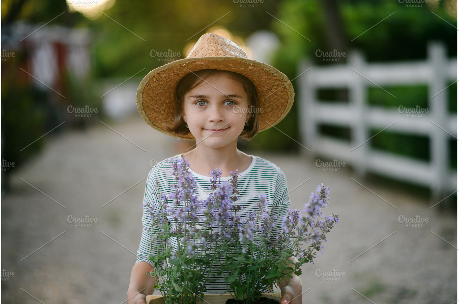 Beautiful young girl helping on, a Nature Photo by HalfPoint