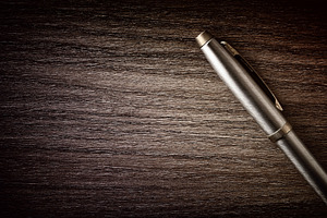 Metal Pen on Dark Wooden Desk, a Business Photo by Davizro's Market