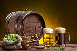 Two mugs of chilled beer, a Food & Drink Photo by Volff