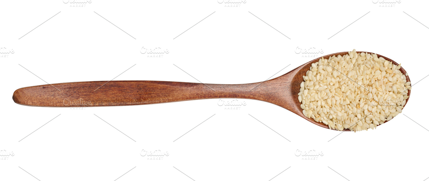 Sesame seeds in a brown wooden spoon on isolated background, top, a Food & Drink Photo by ndanko