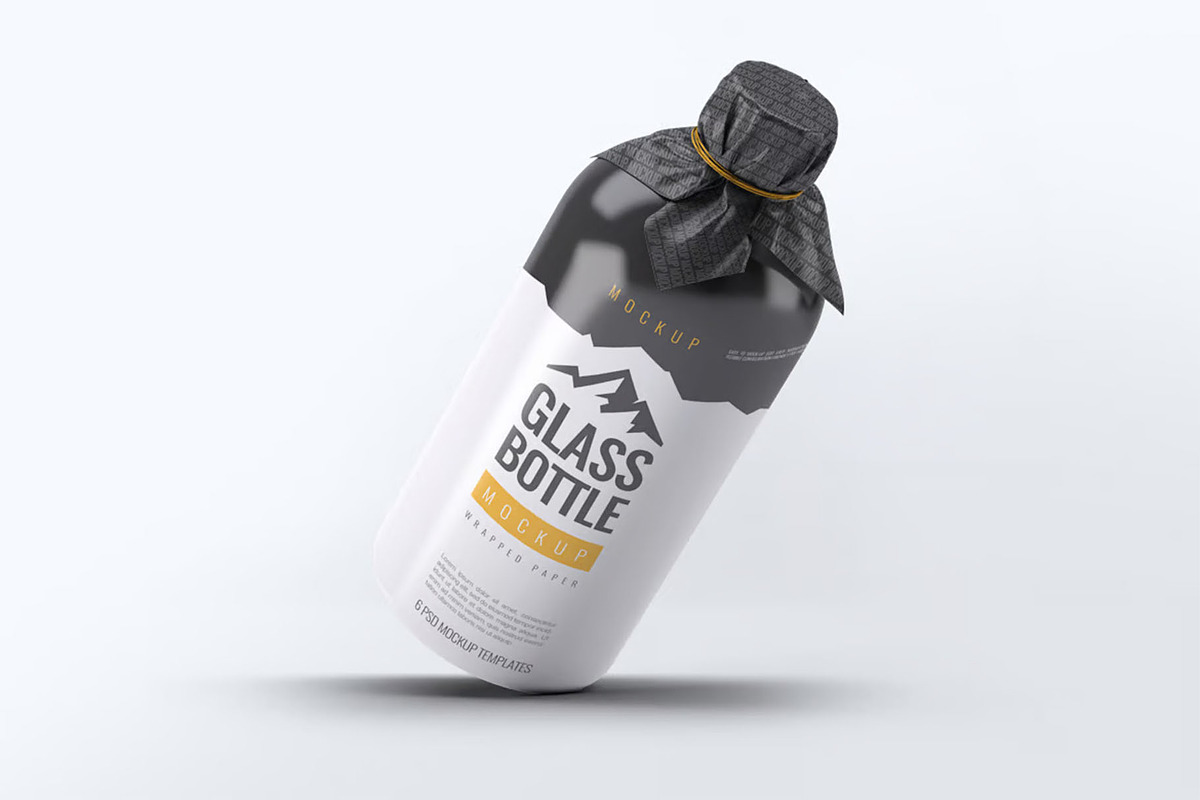 Glass Bottle Wrapped Paper Mock-Up, a Product Mockup by DesignRushMarket (Photo 3 of 7)