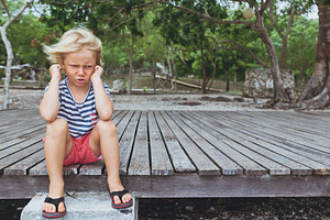 Angry boy stock photo containing unhappy and sad