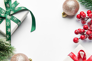 Christmas gifts and decorations forming a festive frame, a Holiday Photo by Olena Rudo