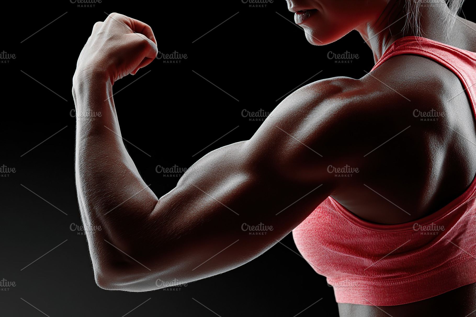 Athlete showcasing arm anatomy in a dynamic side pose against a dark background, a Sports & Recreation Photo by AlyaAnd