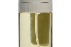 Kitchen bottle dispenser for vegetable oil with plastic cap on i, a Food & Drink Photo by ndanko