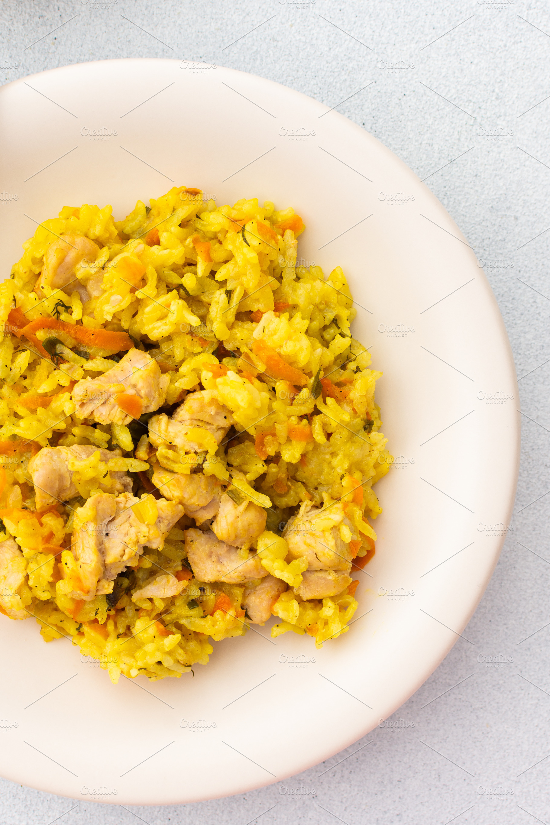 Stewed rice with chicken breast, a Food & Drink Photo by Pundateam