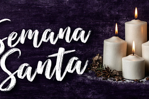 Semana Santa message with white candles and warm flames on dark, a Holiday Photo by José Manuel Gelpi