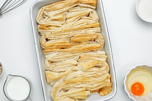 Ingredient egg, milk and sugar to make custard. Baked phyllo dough for Crinkle, a Photo by matucha