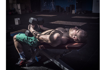 Handsome young man doing abs