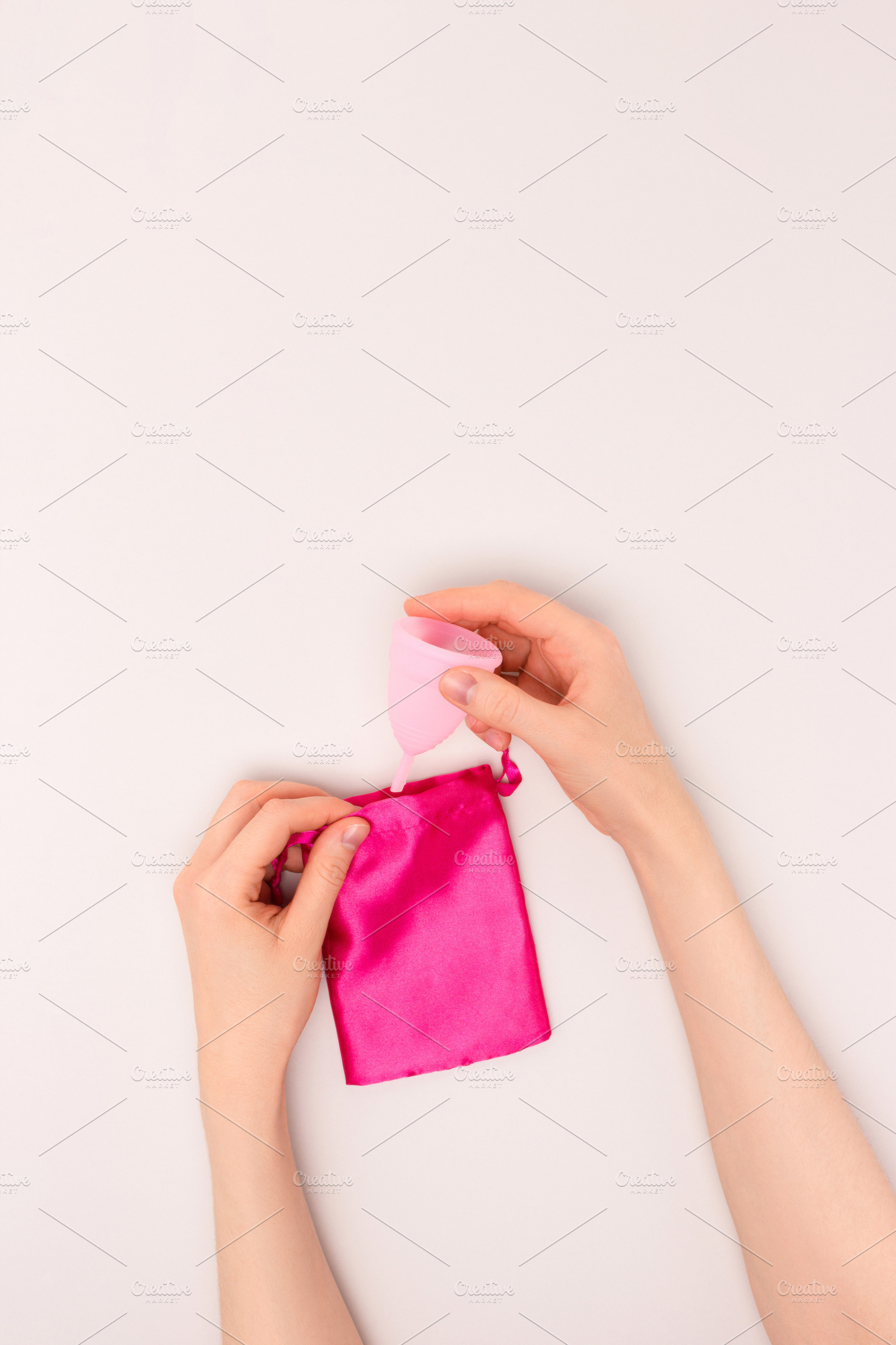 Female hands hold the menstrual cup., a Health & Medical Photo by rorygez fresh