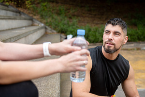 Active woman drinking water after outdoor workout, a Sports & Recreation Photo by etorres69