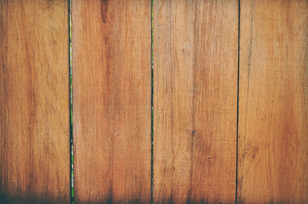 Wooden fence containing wood, fence, and brown