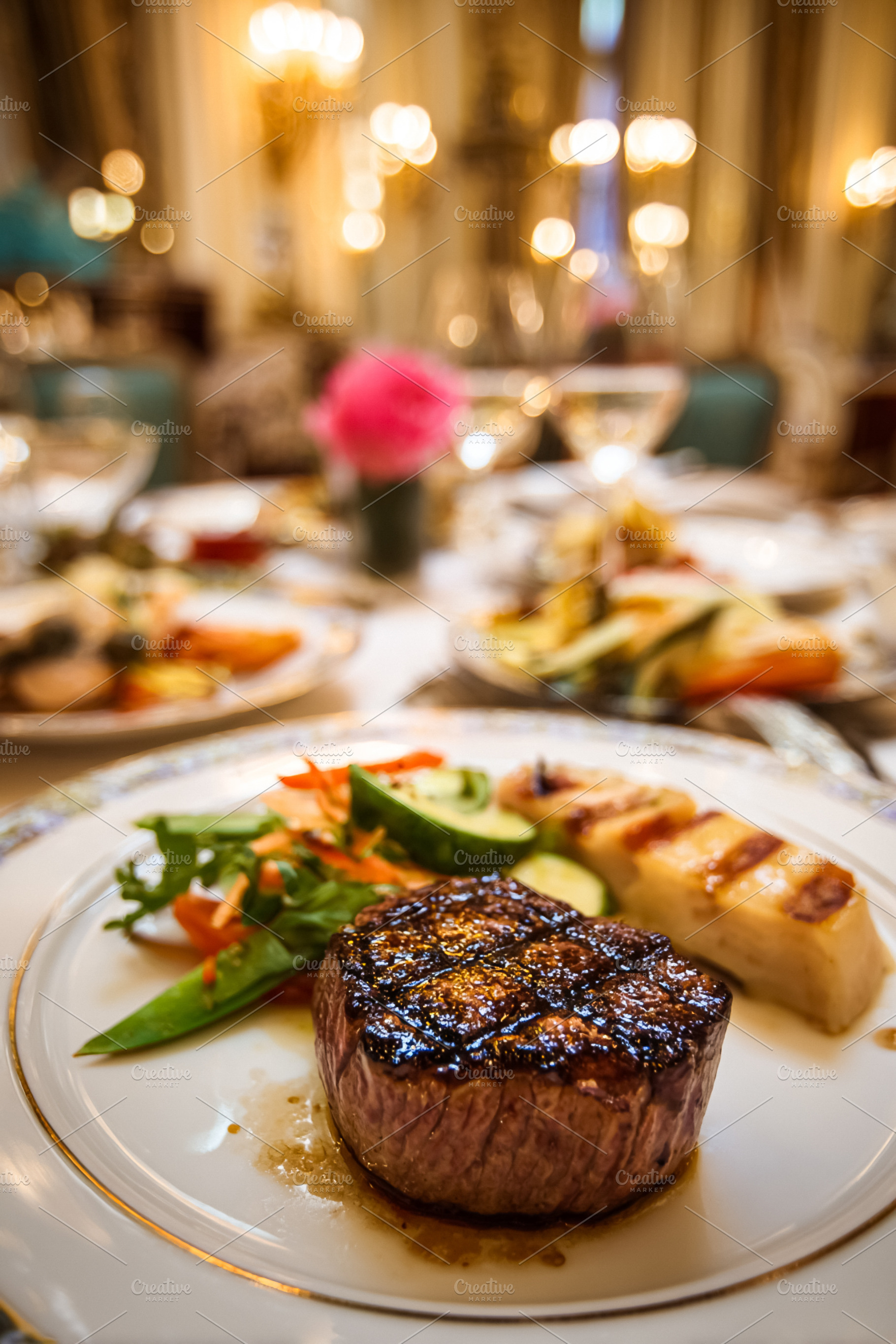 Grilled fillet mignon steak with fresh salad and gratin potato,, a Food & Drink Photo by Studio ANNA