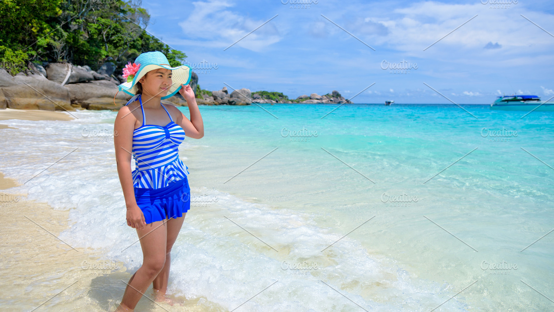 Girl happy on the beach featuring woman, beach, and sea, a Person Photo by yongkiet jitwattanatam