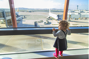 Children look at the airport at the, a Transportation Photo by yanadjana