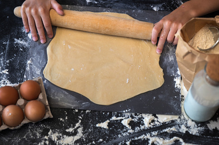 Knead the dough with wheat on dark b stock photo containing dough and pizza
