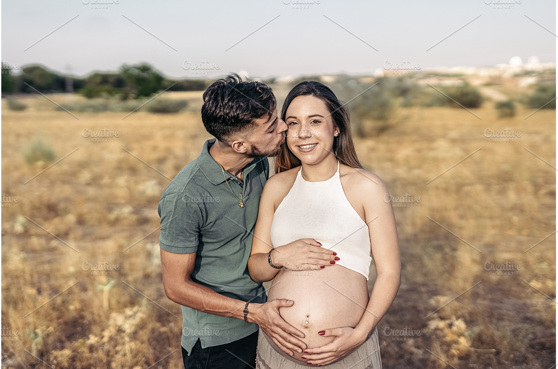 Young Pregnant Woman and her Husband, a Person Photo by nunezimage