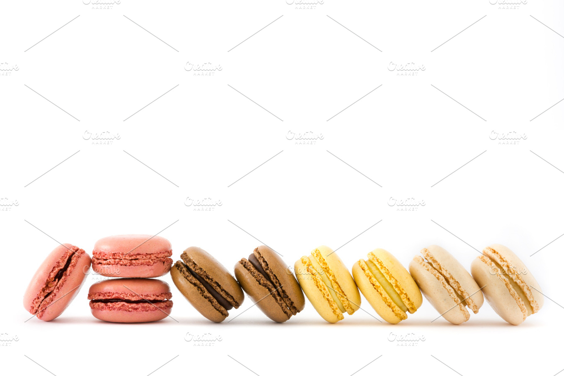 Colorful macarons isolated, a Food & Drink Photo by etorres69