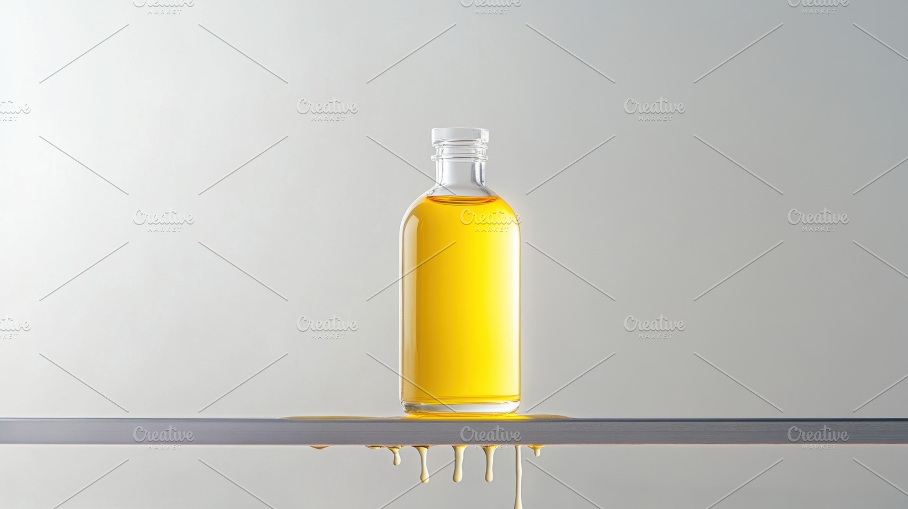 Clear glass bottle of golden oil, a Photo by Beautiful things