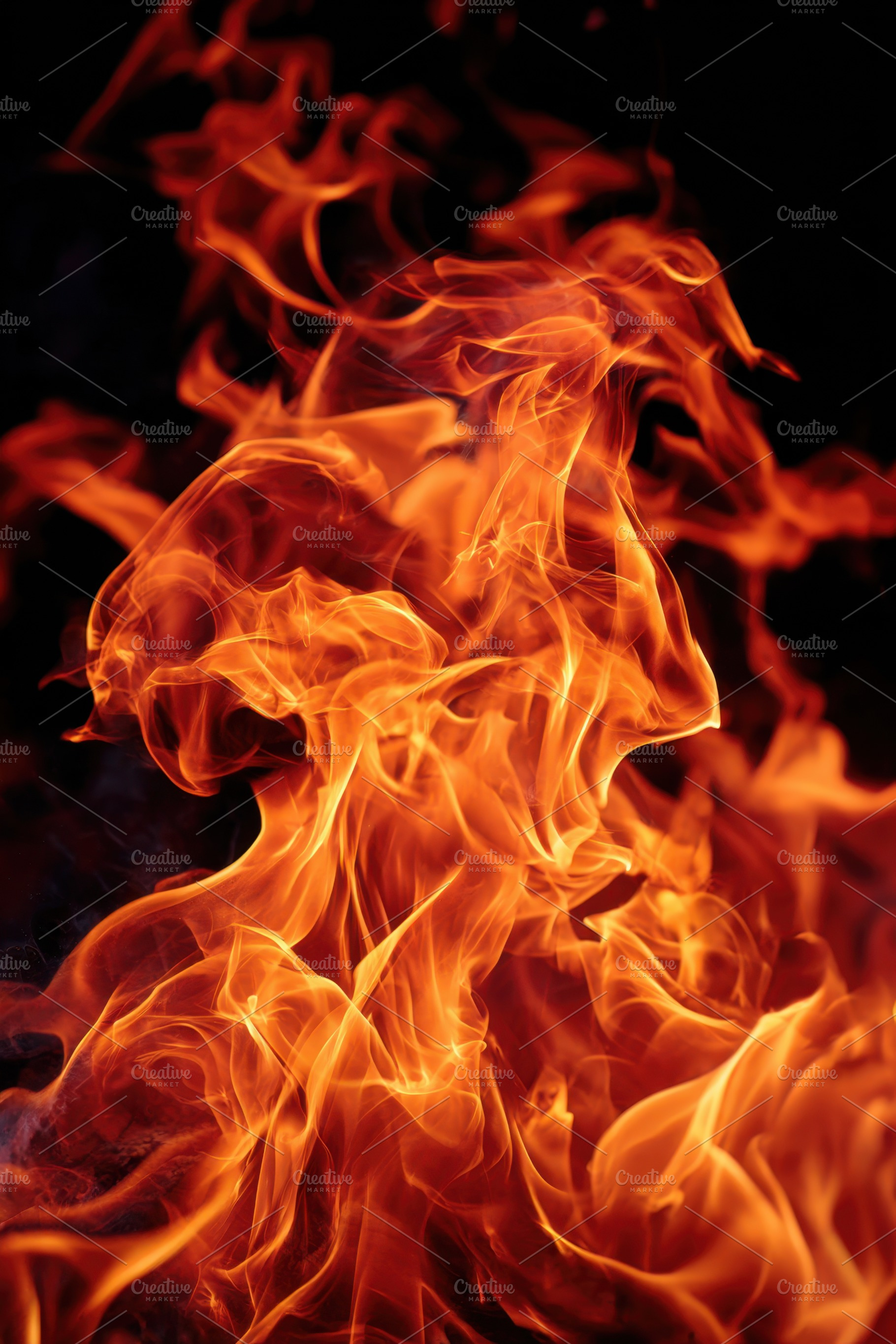 Dynamic close-up of vibrant flames with sparks, a Background Photo by AlyaAnd