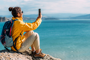 A traveler on the seashore, panorama, a Person Photo by SOTNIKOV_MISHA