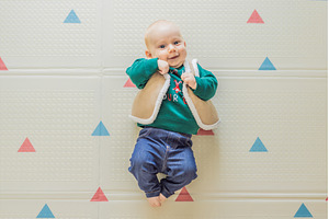 Adorable baby dressed in a Christmas, a Holiday Photo by Elizaveta Galitskaya