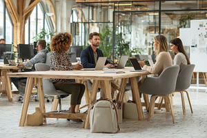 Modern office team collaboration lap, a Photo by Pixeness Studio