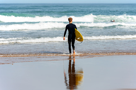 surfer going into the sea, a Sports & Recreation Photo by Perpis