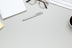 Minimal work area with stationery items and writing materials, a Photo by matucha