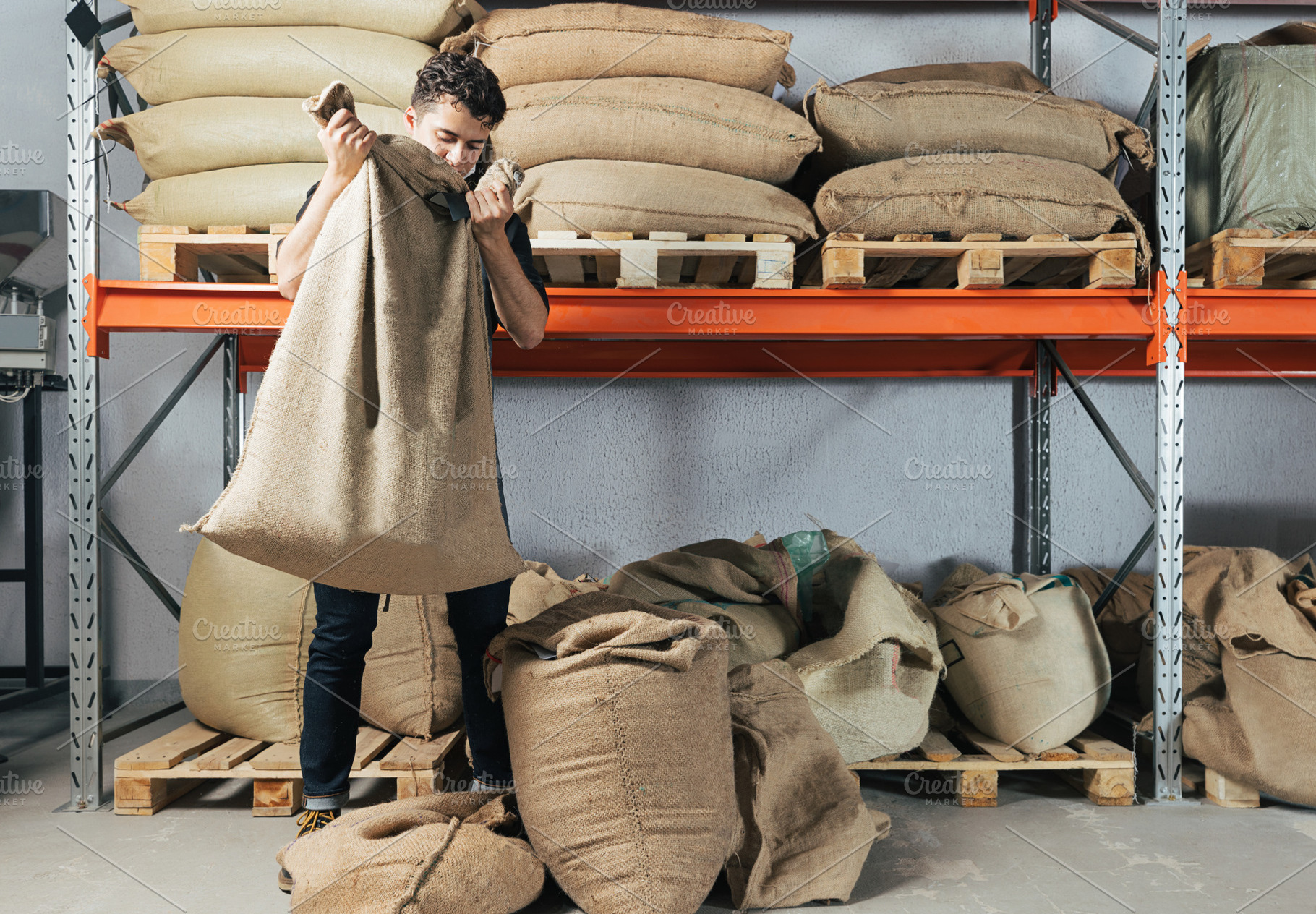Young male warehouse worker, a Person Photo by Artem Varnitsin