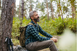 Man meditating in nature, enjoying, a Sports & Recreation Photo by HalfPoint