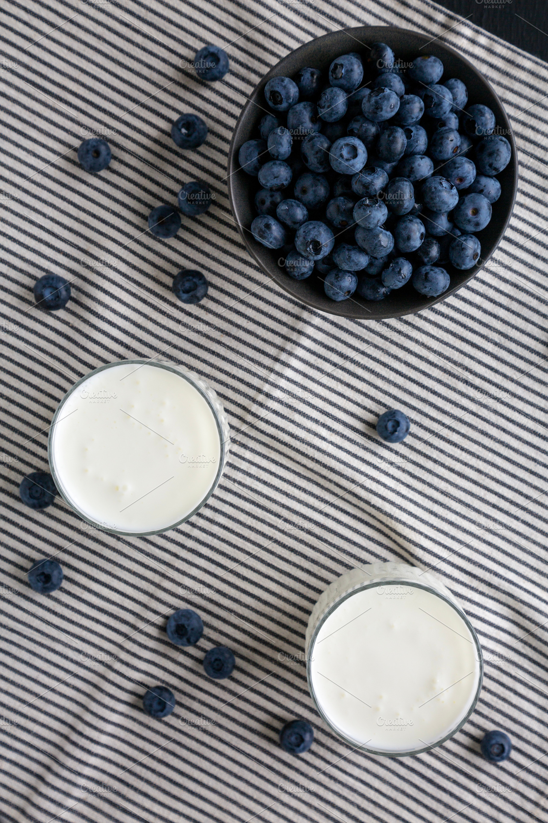 Organic Blueberry Kefir in a Glass, top view., a Food & Drink Photo by LiudmylaChuhunova