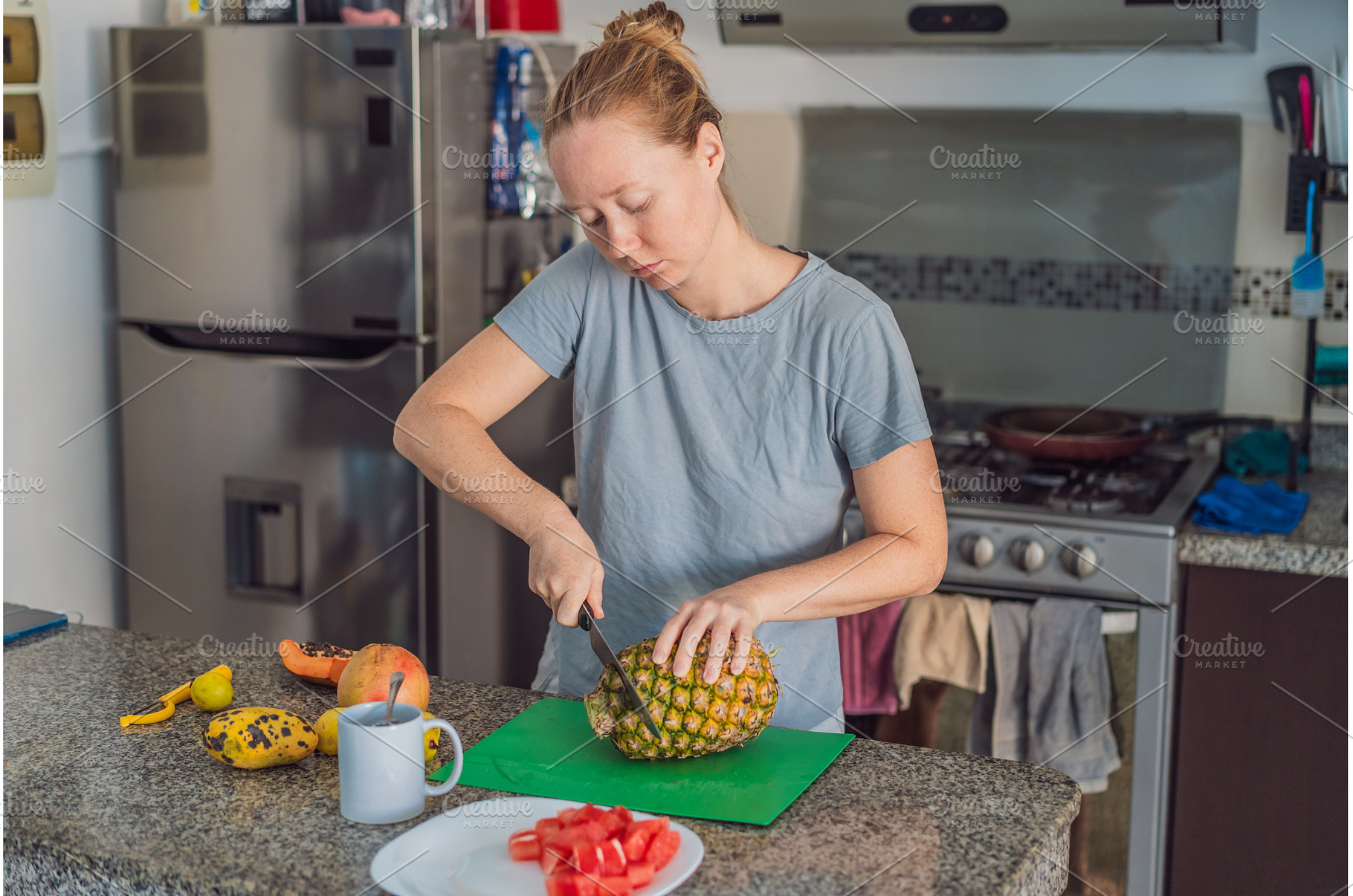 Woman preparing breakfast in a, a Food & Drink Photo by Elizaveta Galitskaya