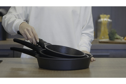 Restaurant. Frying pans. Action, a Person Photo by Media Whale Stock