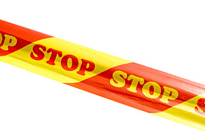 Warning tape with STOP sign isolated, an Industrial Photo by BOOCYS