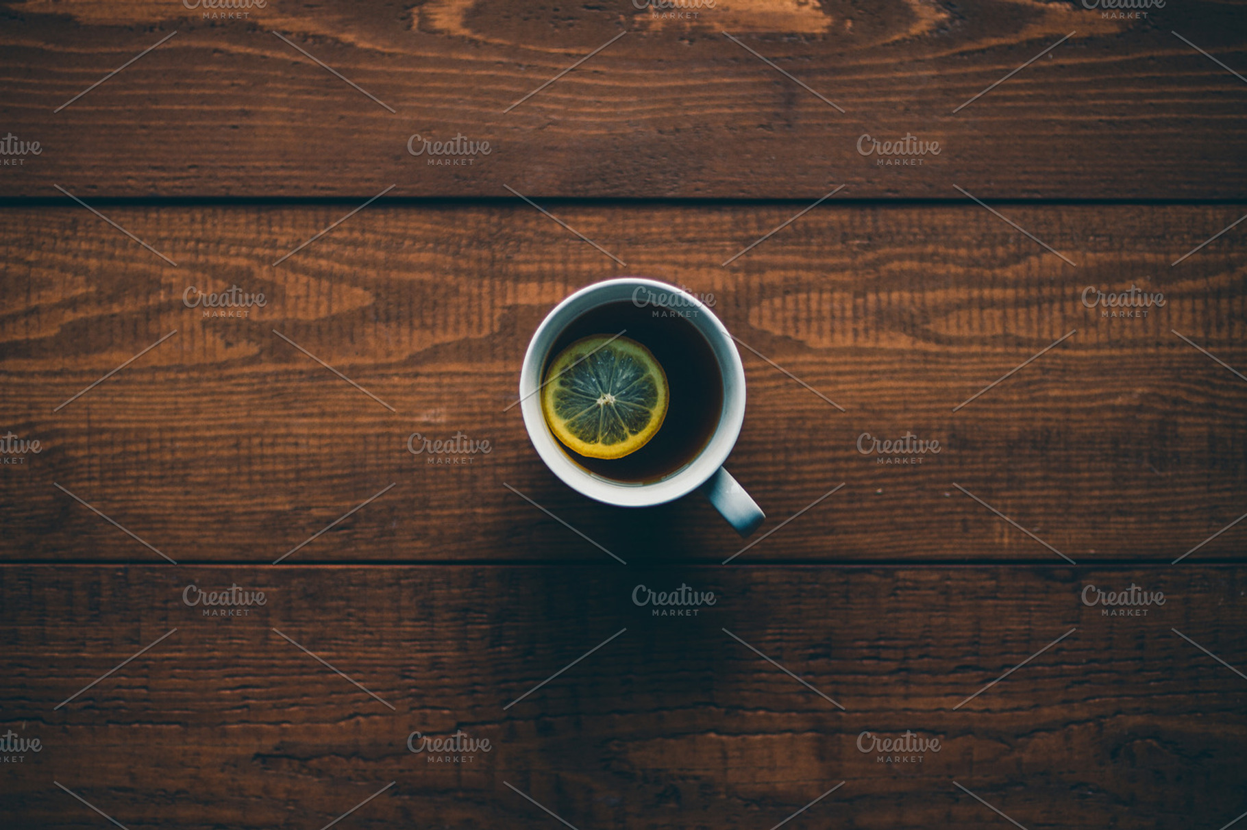 Cup of tea 2 containing tea, cup, and lemon