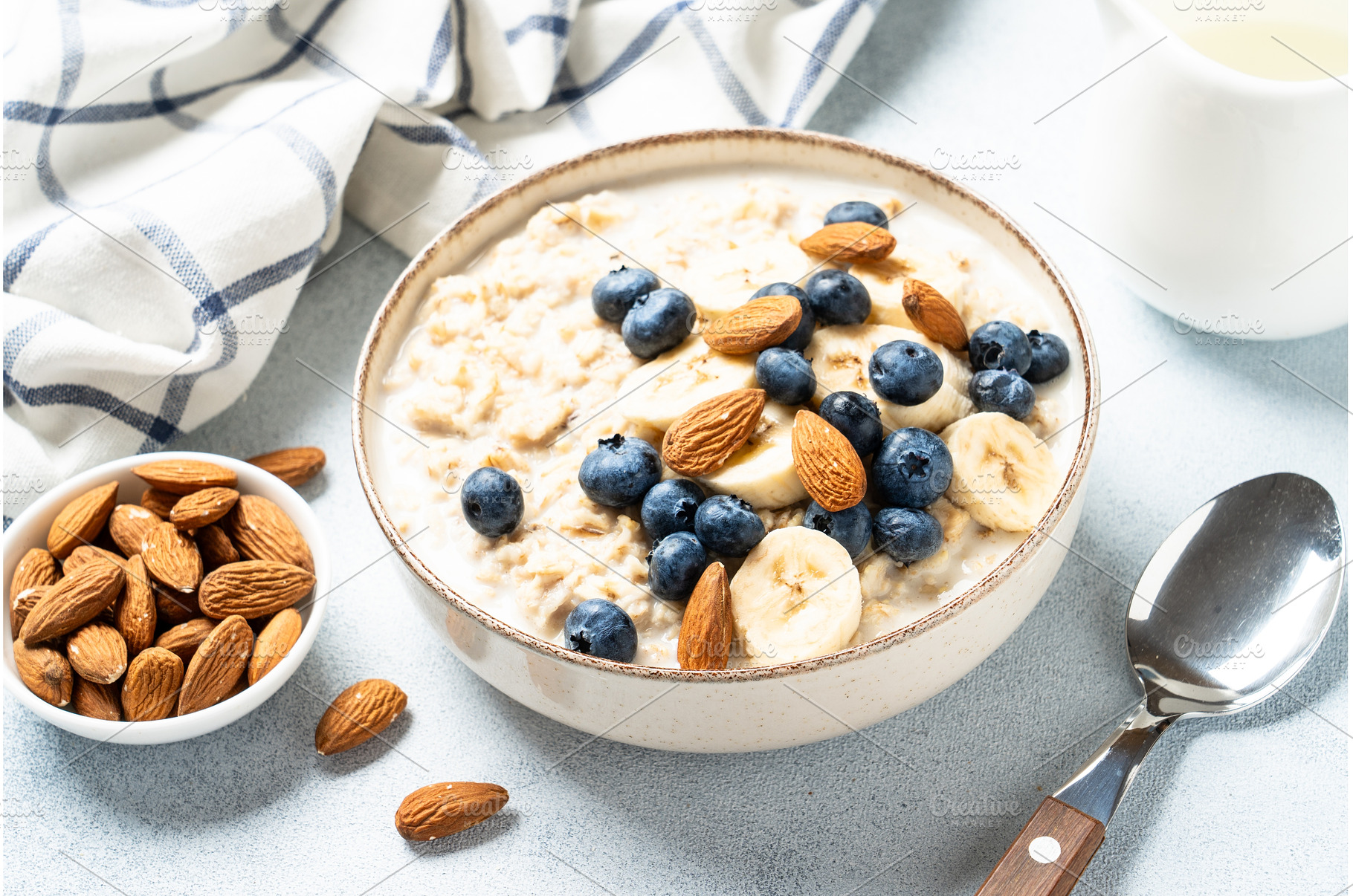 Oatmeal porridge with bananas, nuts, a Food & Drink Photo by Nadia-nb