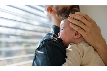 Father comforting his crying baby, a Person Photo by HalfPoint