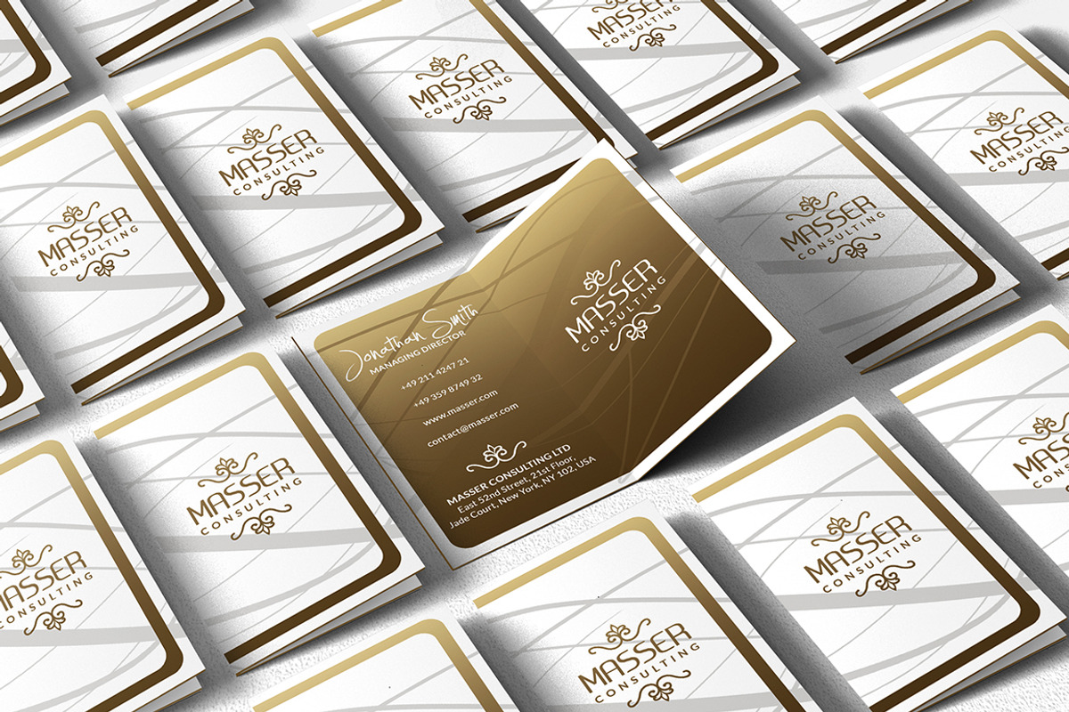 Folded Gold And White Business Card, a Business Card Template by Marvel (Photo 1 of 5)