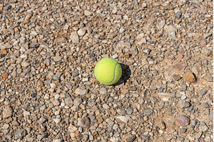 Tennis ball on the brown background, a Sports & Recreation Photo by Illustrations&photos