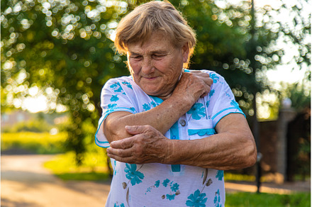 Old woman arm hurts, elbow, a Health & Medical Photo by yanadjana